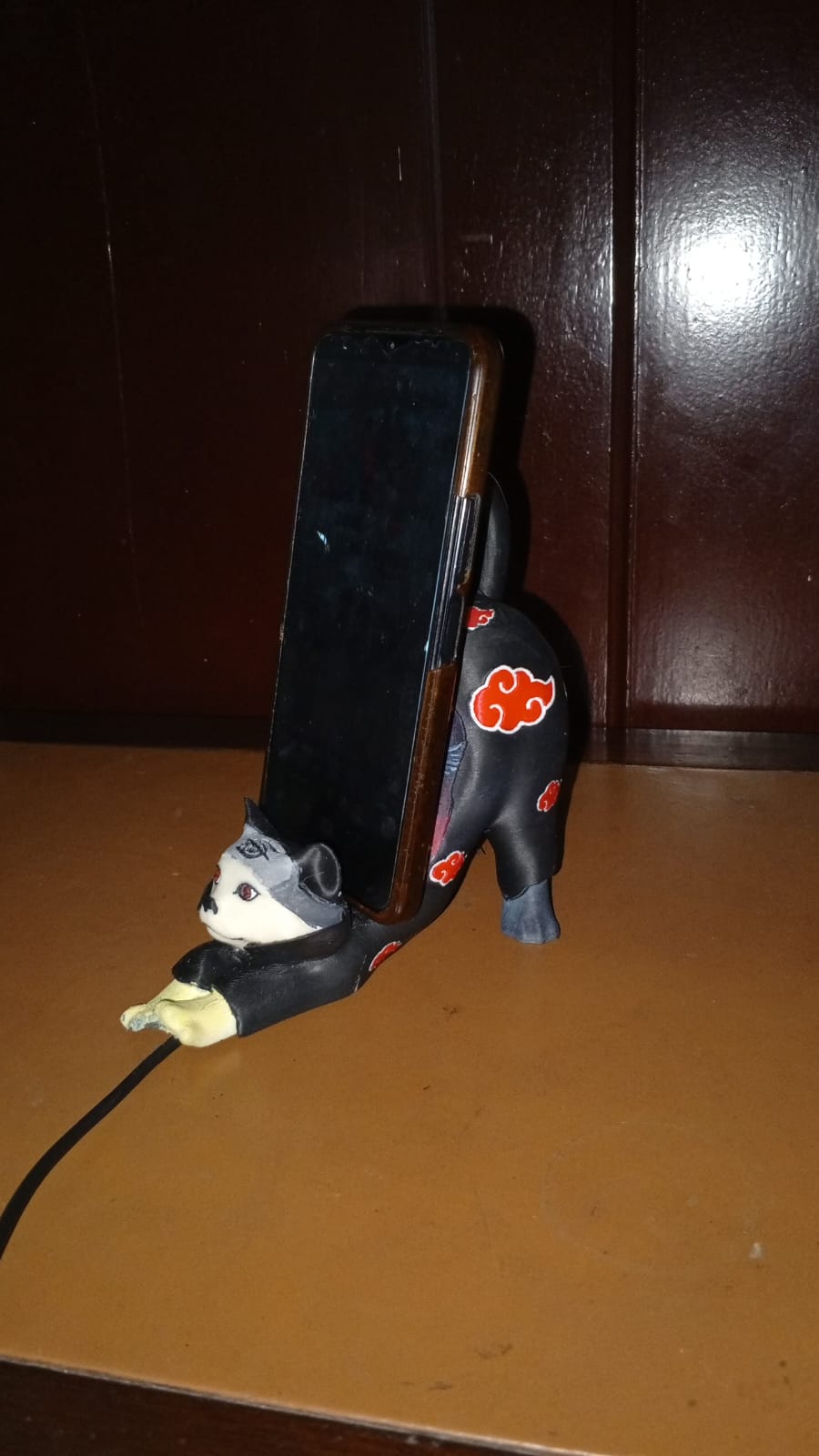 portacelular Itachi Antagonista